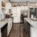 a kitchen with white cabinets
