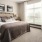 a bedroom with a bed and a chair