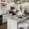a kitchen with white cabinets
